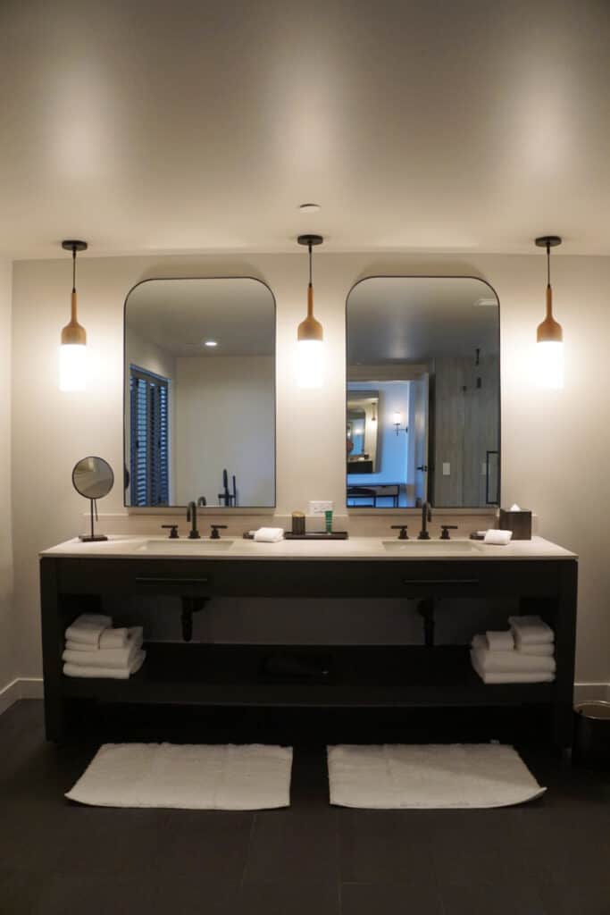 luxury hotel room bathroom with dual vanity