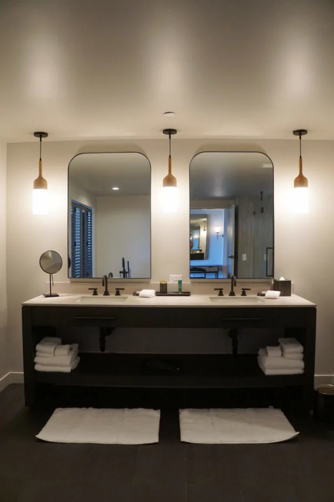 luxury hotel room bathroom with dual vanity