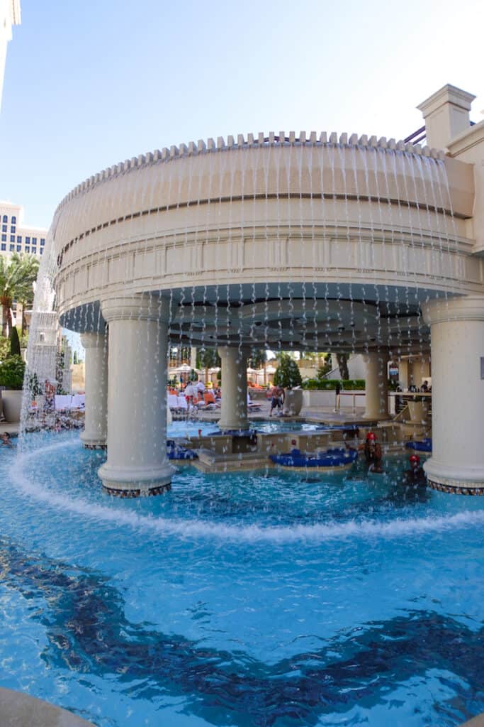 round pool with swim up blackjack table in Las Vegas at Caesars Palace Las Vegas