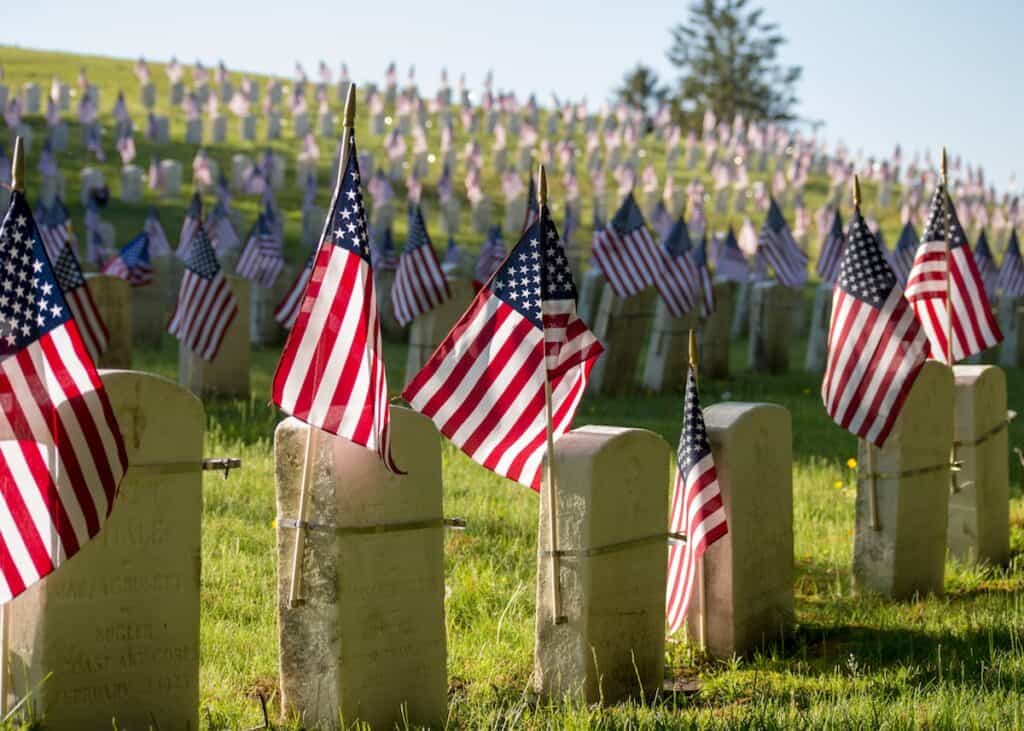 cemetery with flags on gravestones on memorial day, pine grove cemetery, lynn, United states