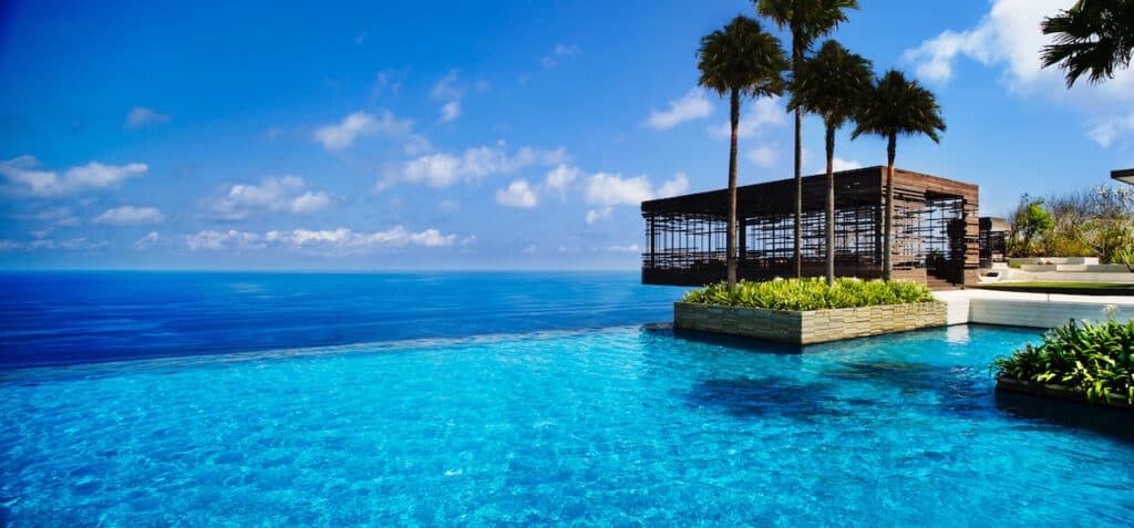 infinity pool at tropical island resort. Alila Villas Uluwatu infinity pool in Bali