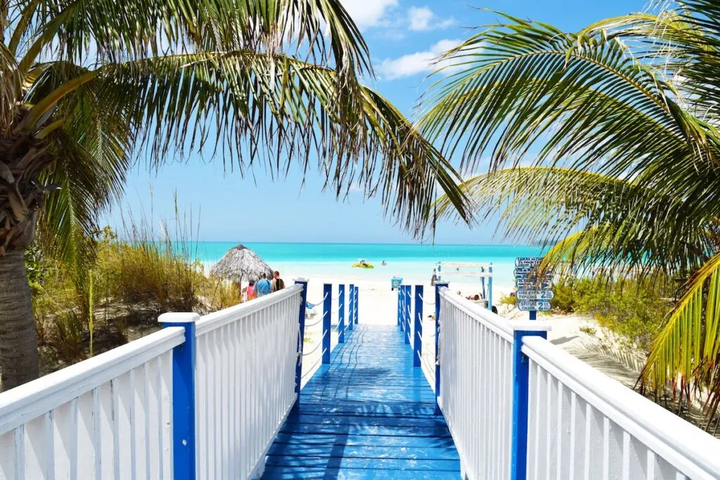 blue and white wooden bridge near beach cayo coco cuba southwest double points