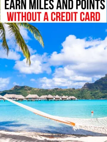 beach hammock hanging from palm tree in front of overwater bungalows