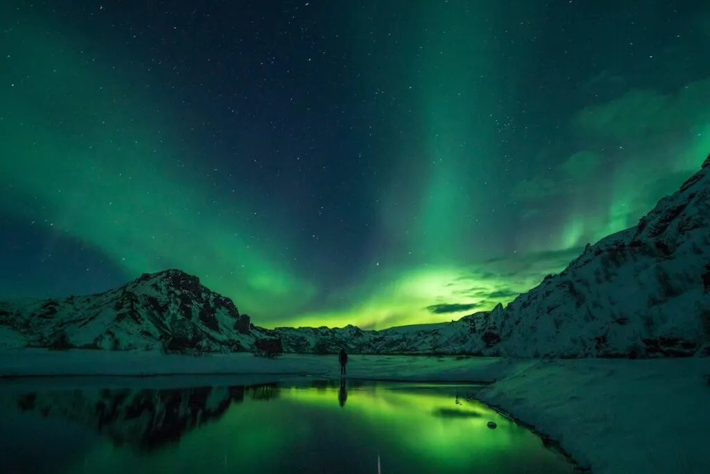 snow mountain with Aurora borealis