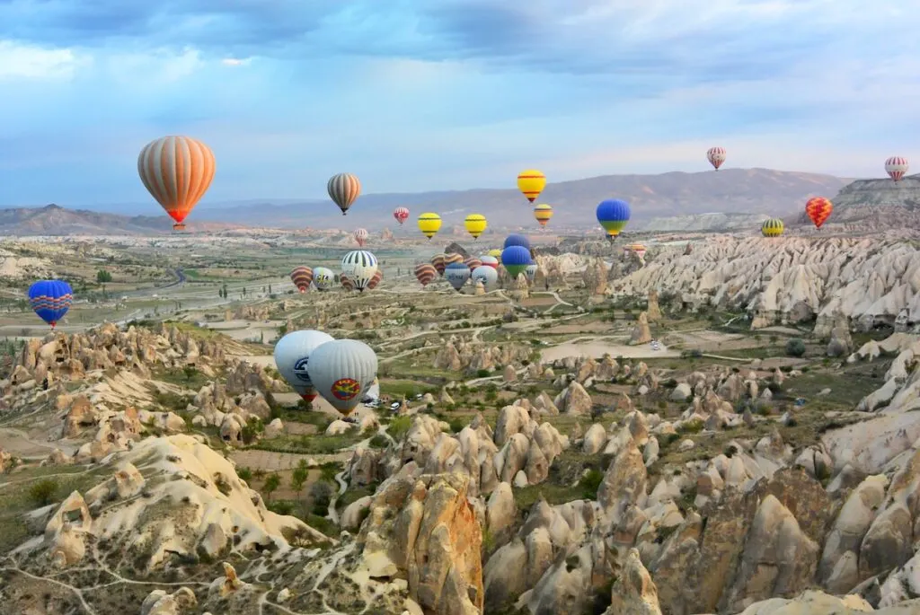 photo of assorted-color air balloon lot in mid air during daytime, Cappadocia Turkey