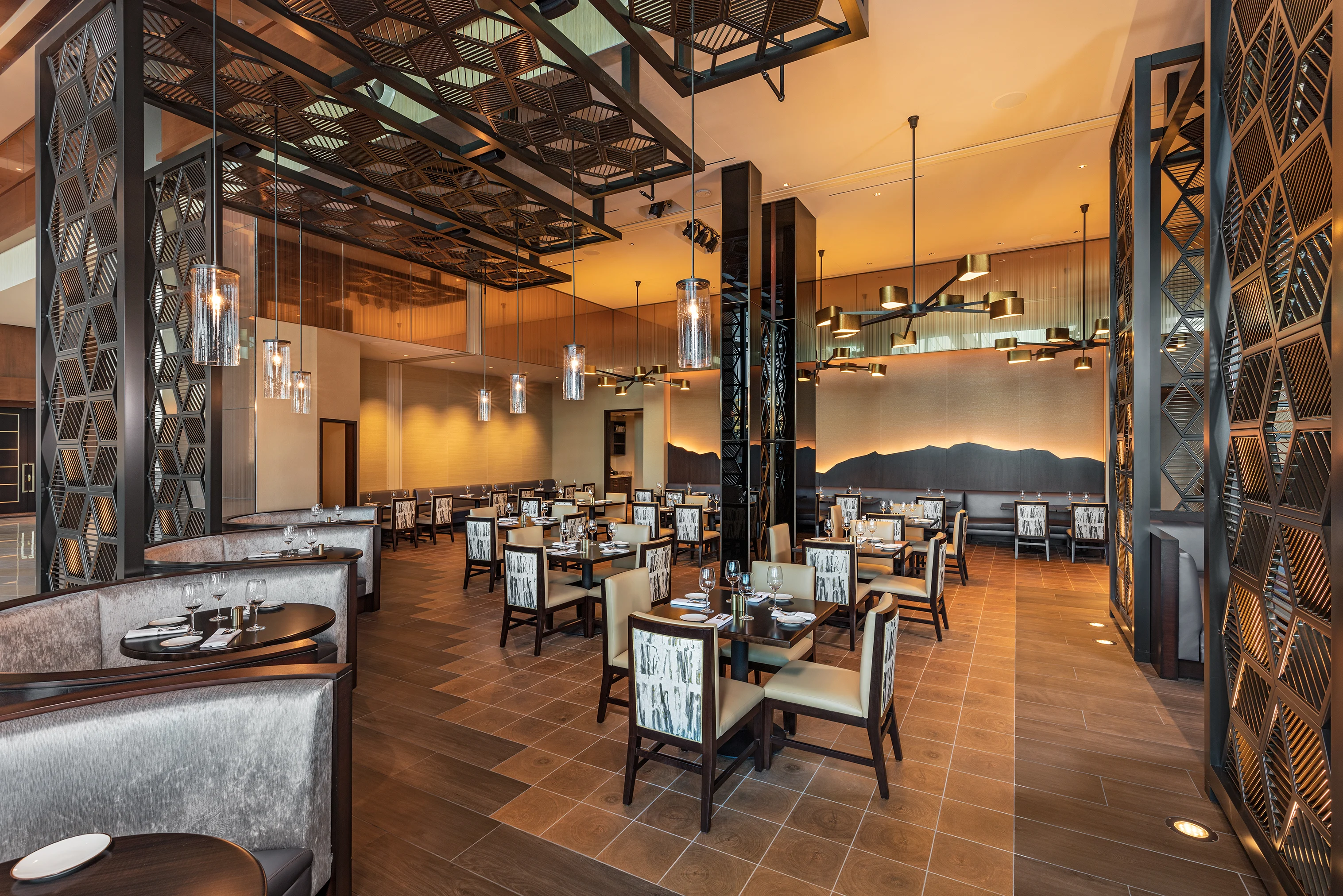 interior of restaurant with dark toned furniture at Pechanga Lobby Bar and Grill