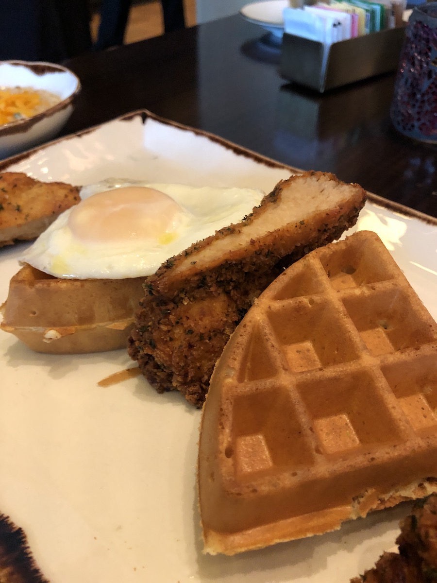 chicken and waffles topped with a fried egg Pechanga Lobby Bar and Grill