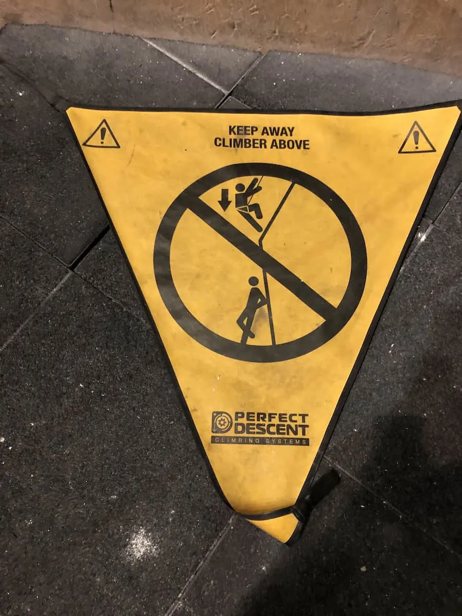 yellow upside down triangle warning flag